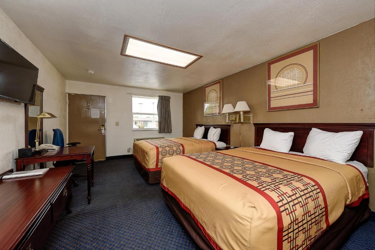 Guest Inn Роджерс Экстерьер фото
