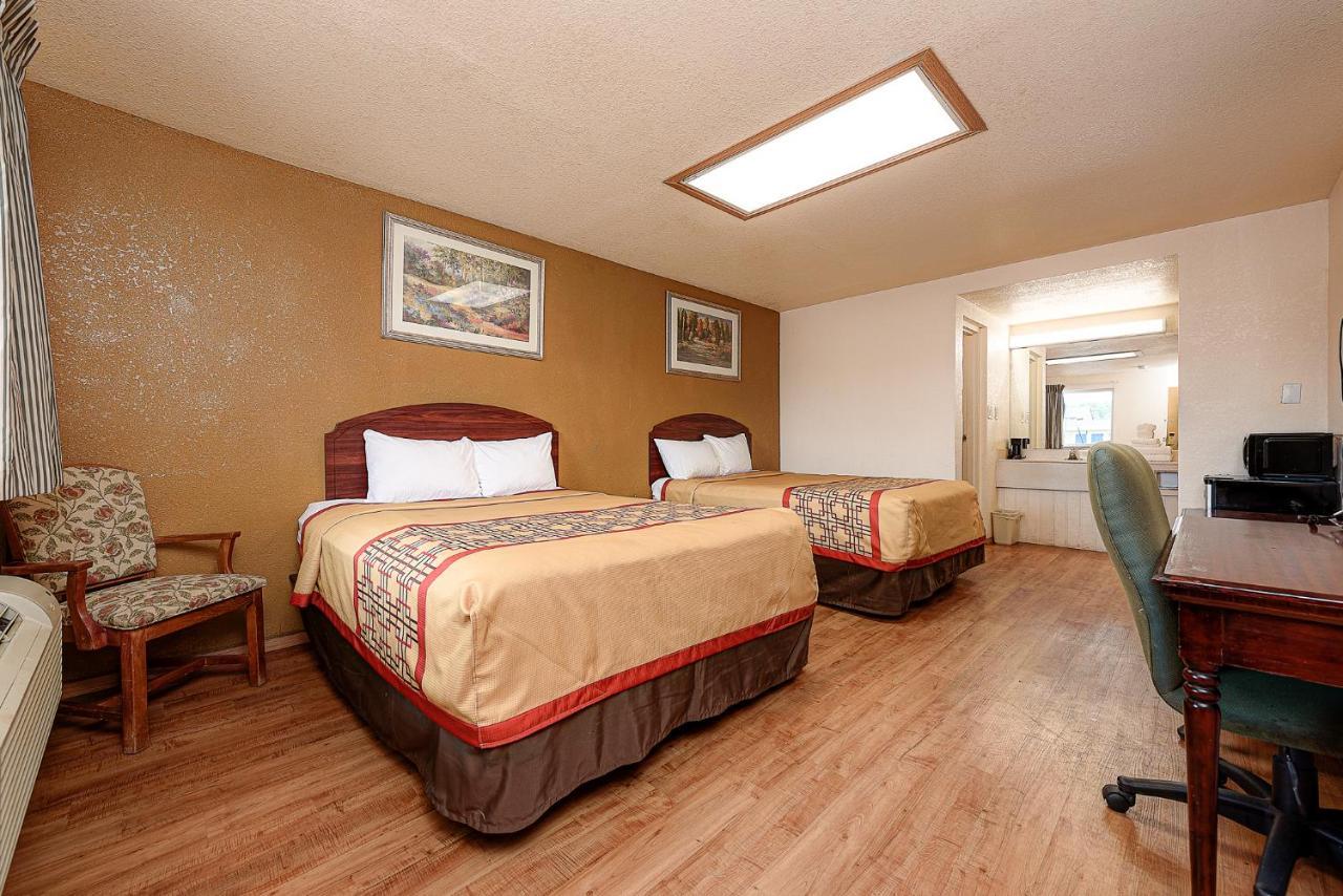 Guest Inn Роджерс Экстерьер фото