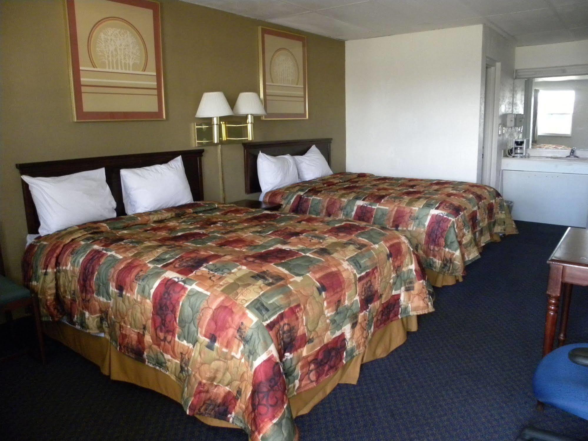 Guest Inn Роджерс Экстерьер фото