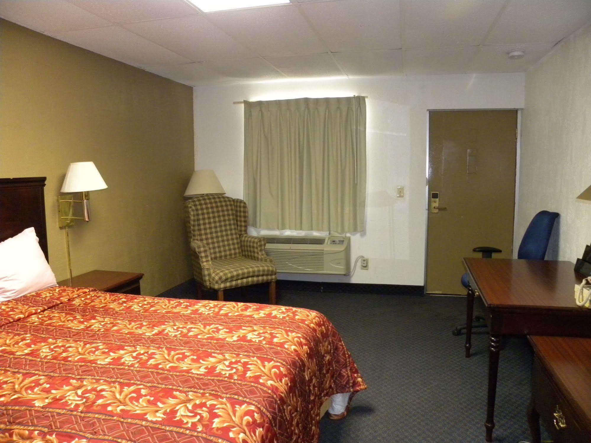 Guest Inn Роджерс Экстерьер фото