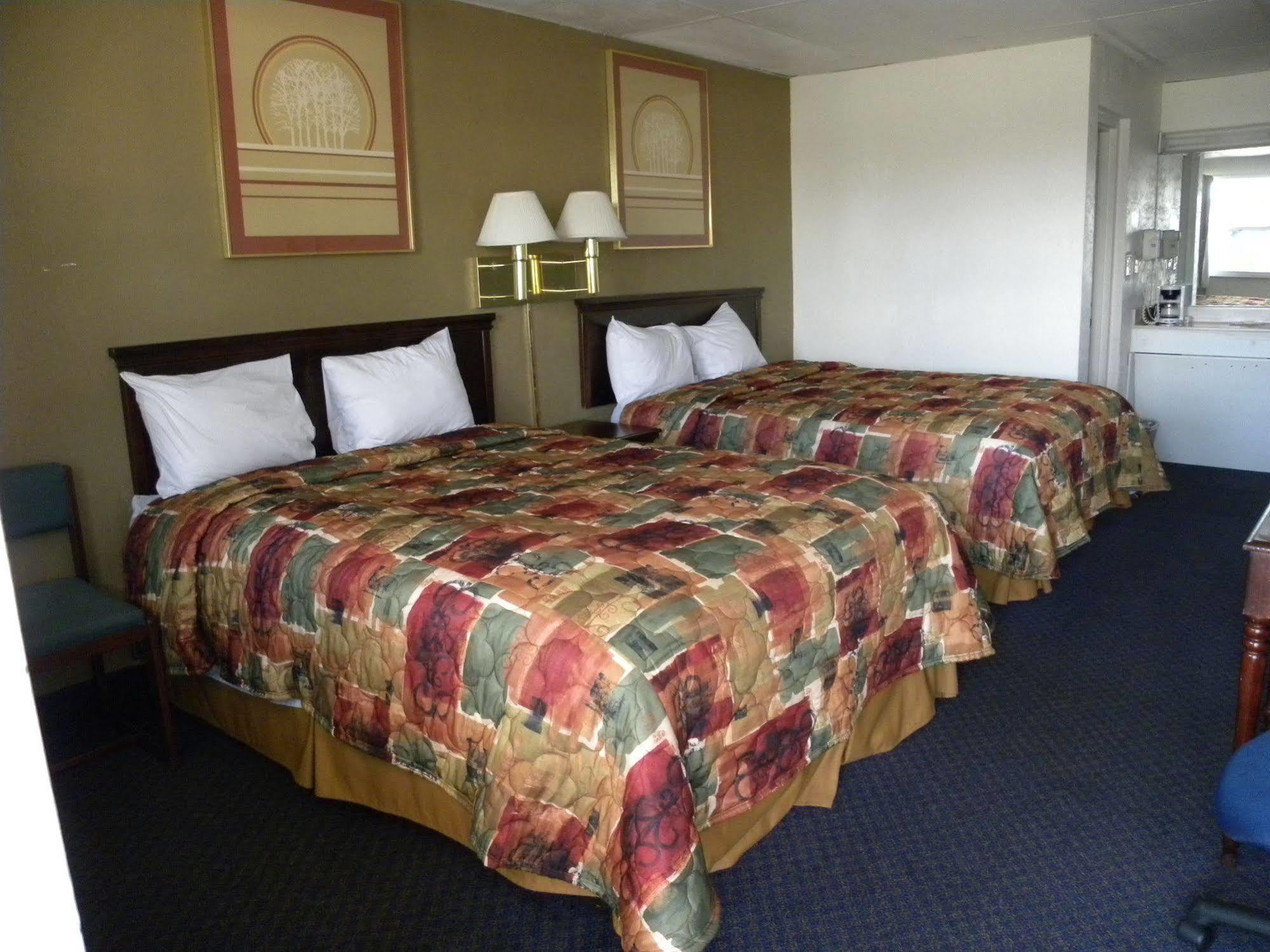 Guest Inn Роджерс Экстерьер фото