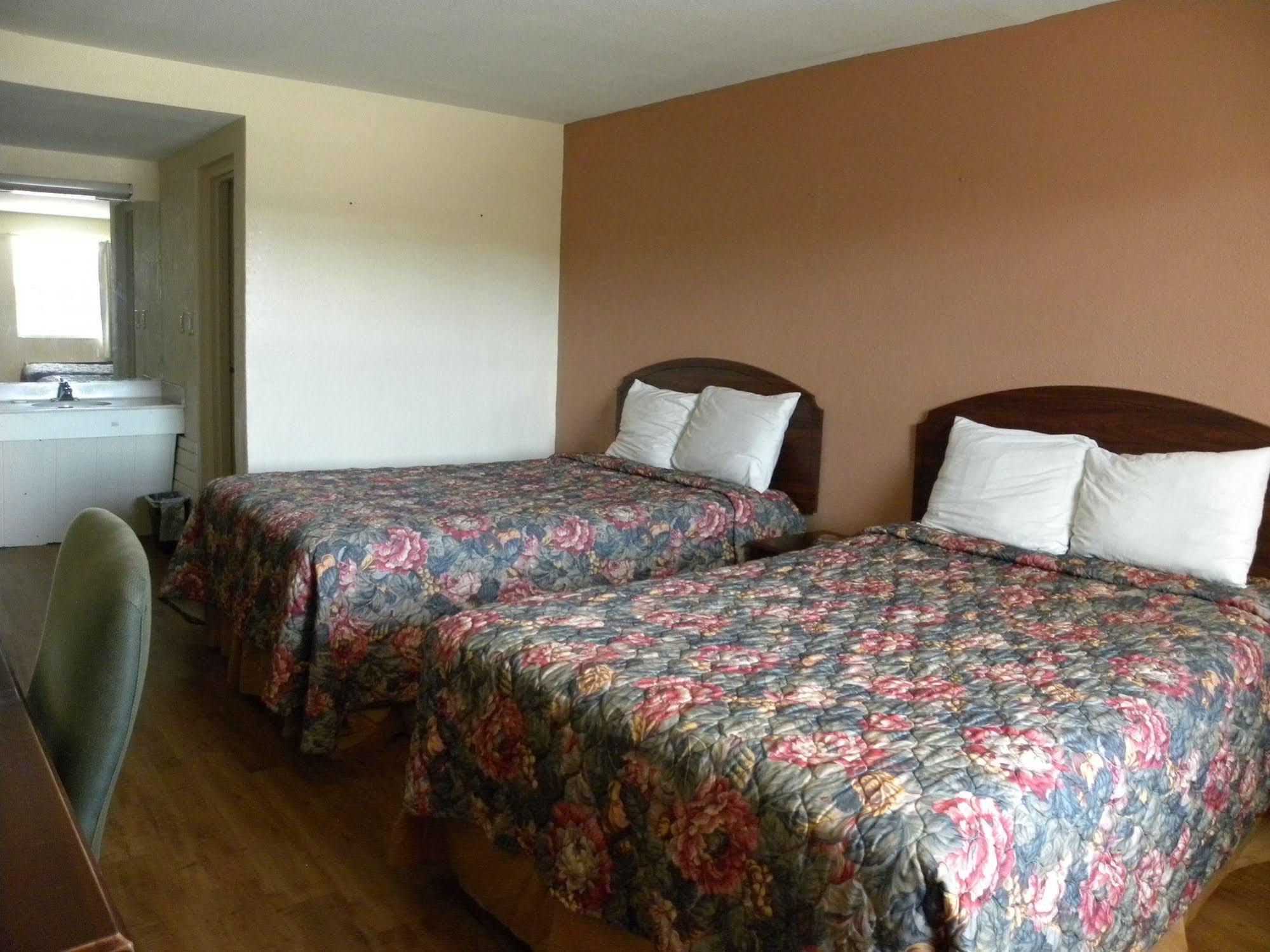 Guest Inn Роджерс Экстерьер фото